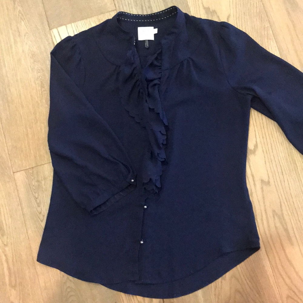 Navy ruffle front blouse from Anthropologie